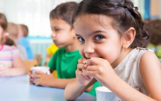 kid eating snack after food allergy testing near me