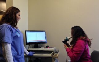 nurse completing breath test with patient to determine las vegas allergies