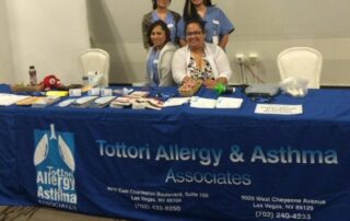 las vegas allergy doctor and nurses at booth at health fair
